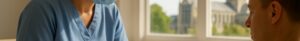 Nurse drawing blood for vitamin deficiency test in sunlit Norwich clinic with cathedral view